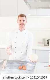 Chef Tossing Pizza Dough