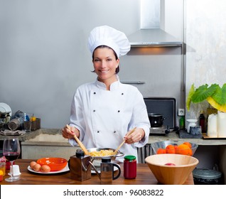 Chef Woman Portrait With White Uniform In The Kitchen