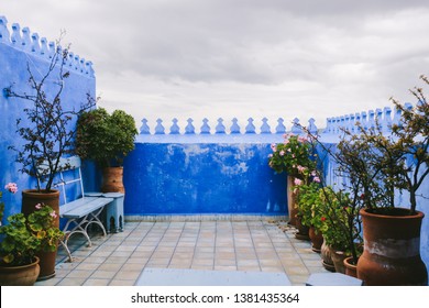 CHEFCHAOUEN, MOROCCO - CIRCA MAY 2018: Terrace of a house in the medina of Chefchaouen, northwest Morocco. The town is famous for its buildings in shades of blue.