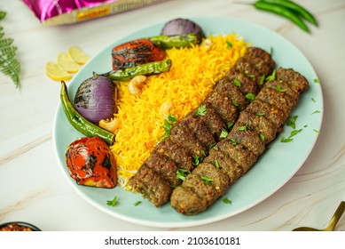 Chelo Kebab With Rice And Tomato Chili And Onion