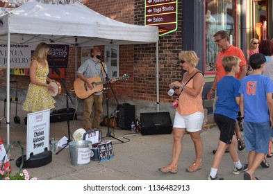 CHELSEA, MI / USA - JULY 12, 2018:  Dave Boutette And Kristi Lynn Davis Perform At The Chelsea Sounds And Sights On Thursday Nights Festival. 

