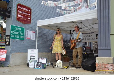 CHELSEA, MI / USA - JULY 12, 2018:  Dave Boutette And Kristi Lynn Davis Perform At The Chelsea Sounds And Sights On Thursday Nights Festival. 

