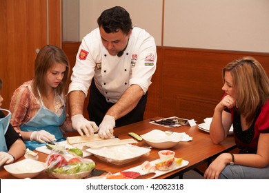 CHELYABINSK - NOVEMBER 17: Chef teaching how to cook sushi at sushi preparing master class, November 17, 2009 in Holiday Inn Chelyabinsk-Riverside 4*, Chelyabinsk, Russia.