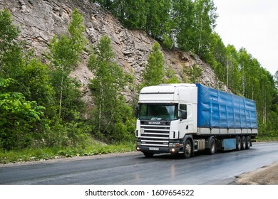 Chelyabinsk region, Russia - June 29, 2008: Semi-trailer truck Scania R380 at the interurban road near the rocks. - Shutterstock ID 1609654522