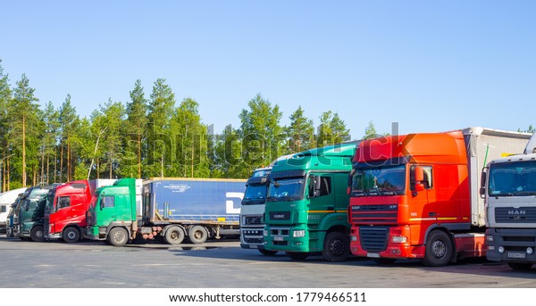 Chelyabinsk, Russia -\
06.28.2020: Trucks are parked, logistics and cargo transportation\
between cities