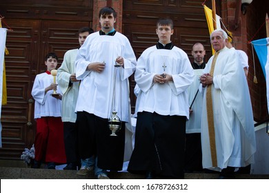 Chelyabinsk, Russia - July 2, 2013: Two servers. Feast of the Body of the Lord in the Roman Catholic Church of the Immaculate Conception of the Blessed Virgin Mary
