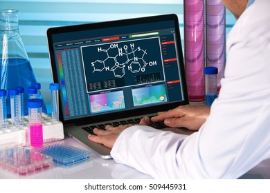 chemical engineer working with analysis software on laptop in the research laboratory / research scientist using computer chemistry lab