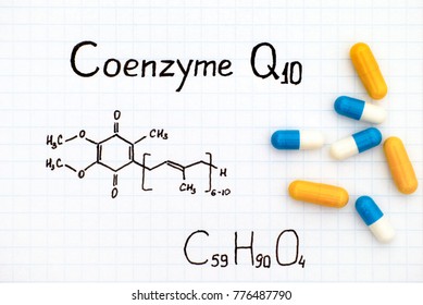 Chemical Formula Of Coenzyme Q10 With Some Pills. Close-up.