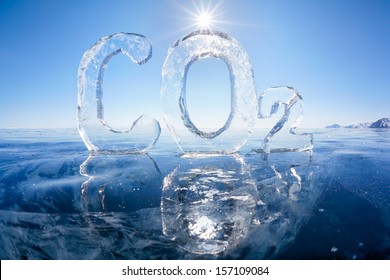 Chemical Formula Of Greenhouse Gas Carbon Dioxide CO2 Made From Ice On Winter Frozen Lake Baikal Under Blue Sky And Sun Rays 