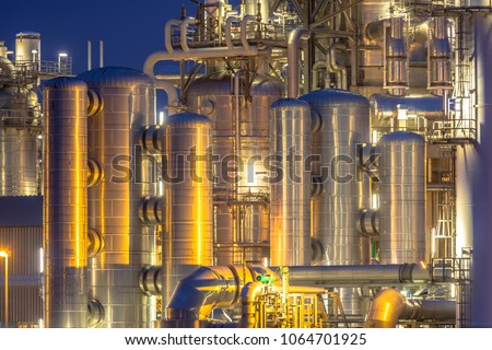 Chemical industry detail installation background at night. Petrochemical close up of factory.
