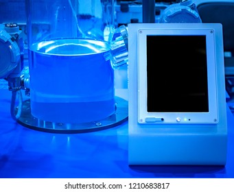 Chemical laboratory. Chemical control. Chemical Research. Monitor at the glass bulb. Check the quality of liquids. Supervision of water pollution. - Powered by Shutterstock