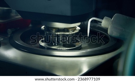 Chemical laboratory and a process of making tests and doing researches using professional equipment. Stock footage. Adding solution inside centrifuge.