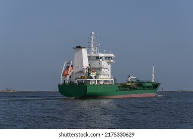 CHEMICAL OIL PRODUCTS TANKER - Ship sails from the port on a cruise to sea