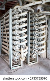 Chemical Plant Interior With Equipment. Double Pipe Heat Exchanger Or Hairpin Heat Exchanger With Longitudinal Fins, As An Example Of Simplest Form Just Pipe Inside Another Larger Pipe.