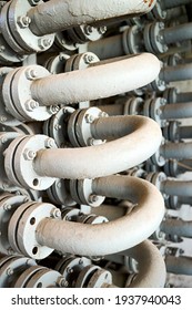 Chemical Plant Interior With Equipment. Part Of Double Pipe Heat Exchanger Or Hairpin Heat Exchanger With Longitudinal Fins As An Example Of Simplest Form Just Pipe Inside Another Larger Pipe.