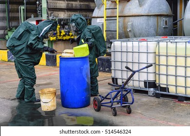 Chemical Spill Pollution Response Team In Action Recovery Stop Spill Of The Chemical Spill Pollution At Factory . Hazard Emergency Response Concept .