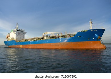 Chemical tanker ship is anchored at sea.