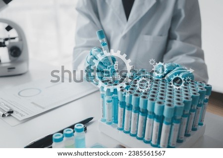 Chemist is chemically analyzing test tubes, Scientist is experimenting with chemicals in the laboratory, Chemist is separating compounds in test tubes with chemical reagents.