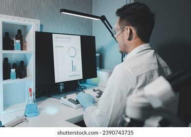Chemist taking notes on research data, Scientist is working in the laboratory, Chemist is analyzing experimental results and taking notes in the laboratory, lab idea.