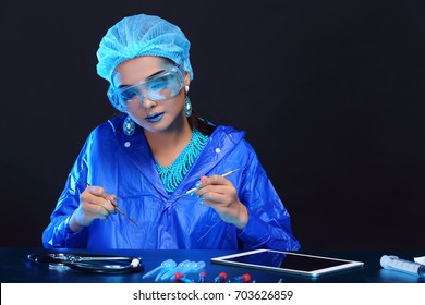 Chemistry Asian Doctor Woman With Fashion Make Up Fancy Lab Test Dress, Studio Lighting Black Dark Background, Safety Gear Hygiene Hat And Tube Glass