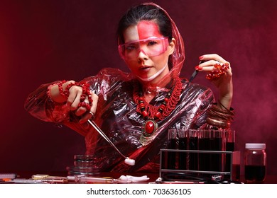 Chemistry Asian Doctor Woman With Red Tone Fashion Make Up Fancy Lab Test Dress, Studio Lighting Black Dark Background, Safety Gear Hygiene Hat And Tube Glass