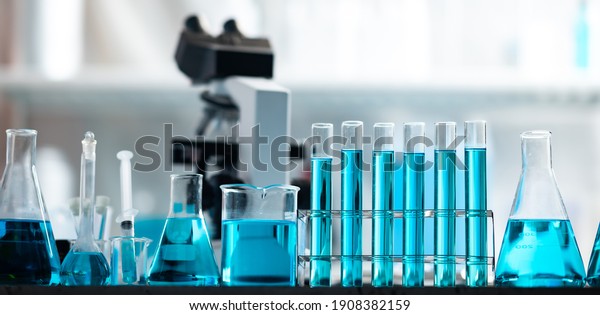 Chemistry\
laboratory glassware, science laboratory research and development\
concept, flask, beaker, and test tubes with blue liquid water\
sample test, scientific test tubes\
equipment