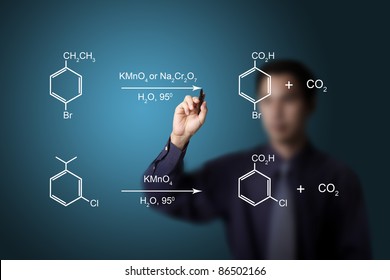 Chemistry Teacher Writing Scientific  Formula Equation