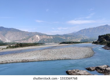 Chenab River Surrounded By Mountains