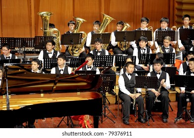 CHENGDU - APR 23: Student Symphonic Band Of High School No.7 Chengdu Perform On Concert On Apr 23,2011 In Chengdu,China.