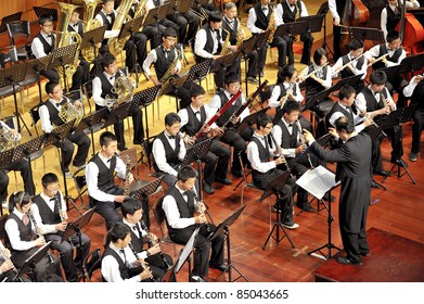 CHENGDU - APR 23: Student Symphonic Band Of High School No.7 Chengdu Perform On Concert On Apr 23,2011 In Chengdu,China.