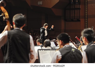 CHENGDU - APR 23: Student Symphonic Band Of High School No.7 Chengdu Perform On Concert On Apr 23,2011 In Chengdu,China.