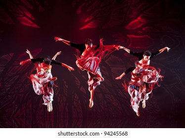 CHENGDU - OCT 17: Chinese Yi National Dancers Perform Contemporary Dance On Stage At JINCHENG Theater On Oct 17, 2011 In Chengdu, China.