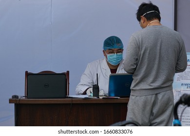 Chengdu/China-March.2020: During the epidemic of coronavirus disease spreading to the world, doctors are busy at hospital vendor check-up quarantine for new COVID-19 coronavirus.