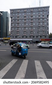 Chengdu,Sichuan,China-October 30, 2021: An Electric Garbage Truck Driving In The City.