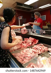 Chengdu,Sichuang/China-August 25, 2019:Shoppers Buying Food At Wal-mart.The Escalating Trade War Between The United States And China And African Swine Fever Have Caused Local Prices To Rise.