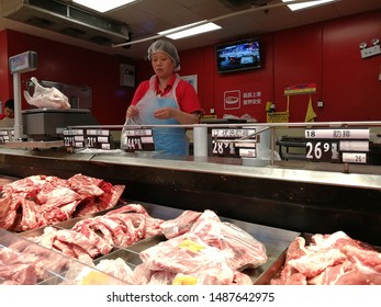 Chengdu,Sichuang/China-August 25, 2019:Shoppers Buying Food At Wal-mart.The Escalating Trade War Between The United States And China And African Swine Fever Have Caused Local Prices To Rise.