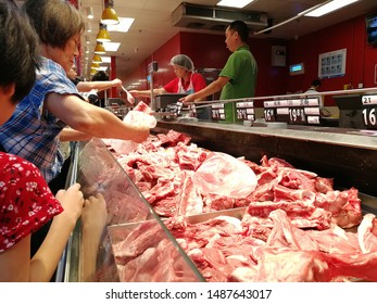 Chengdu,Sichuang/China-August 25, 2019:Shoppers Buying Food At Wal-mart.The Escalating Trade War Between The United States And China And African Swine Fever Have Caused Local Prices To Rise.