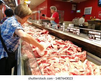 Chengdu,Sichuang/China-August 25, 2019:Shoppers Buying Food At Wal-mart.The Escalating Trade War Between The United States And China And African Swine Fever Have Caused Local Prices To Rise.