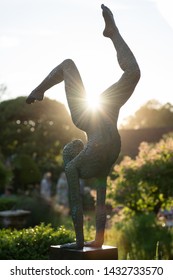 Chenies Manor, Buckinghamshire/UK - June 6 2019: Sculpture By Jonathan Hateley Titled Beginnings. Bronze Resin Shot From Several Angles And With Different Lighting Scenarios.