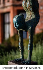 Chenies Manor, Buckinghamshire/UK - June 6 2019: Sculpture By Jonathan Hateley Titled Beginnings. Bronze Resin Shot From Several Angles And With Different Lighting Scenarios.