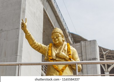 Chennai India August 26 2018 Golden Statue Of Former Chief Minister M G Ramachandran (known As MGR) With Two Fingers Representing The Political Party Two Leaf Symbol.selective Focus On The Subject.