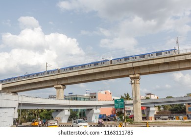 Chennai, India July 29 2018. National Highway (known As Kathipaara Junction Near Guindy) Seen With Vehicles Speeding On The Road On Separate Lanes With Metro Train Moving On Flyover