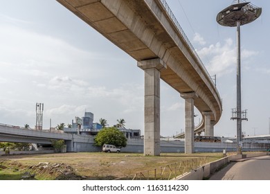 Chennai India. July, 29 2018 National Highway (known As Kathipaara Junction Near Guindy) Seen With Vehicles Speeding On The Road On Separate Lanes With Metro Train Moving On Flyover