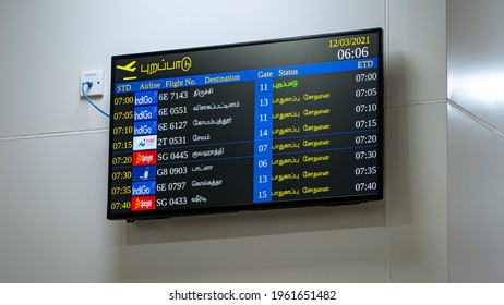 Chennai, India - March 12, 2021: Departures Information Displayed In Tamil On Television At The Chennai International Airport.