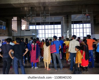 Chennai India May 27 2018 Bunch Of People Seen Waiting For A Metro Train During Festival Or Holiday Season Seen With Bright Sunlight Through Window Panels