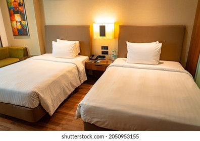 Chennai, India - October 1, 2021: Two Luxury Twin Beds In A Hotel Room.