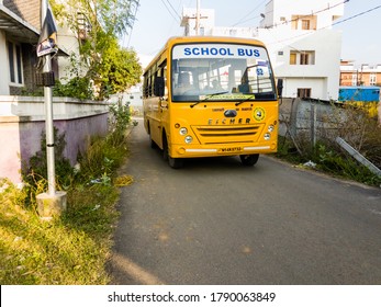 Chennai, Tamil Nadu, India - January 2020: A Yellow School Bus Transporting Children To School In Suburban Chennai.