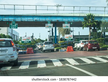 Chennai, Tamil Nadu, India - September 27, 2020: Cars Waiting In Line At The Famous Uthandi Toll Plaza Located On The Scenic East Coast Road Highway.