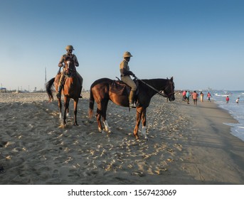 CHENNAI,TAMIL NADU/INDIA-MARCH 2nd 2018: Police Horsemen Patrol Up And Down The Shore At Marina Beach.