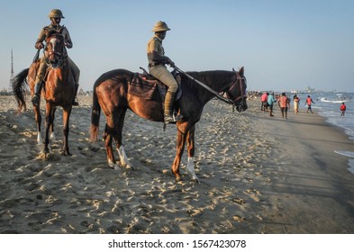 CHENNAI,TAMIL NADU/INDIA-MARCH 2nd 2018: Police Horsemen Patrol Up And Down The Shore At Marina Beach.